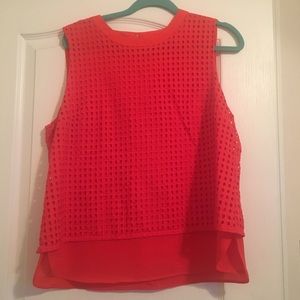 Red sleeveless blouse